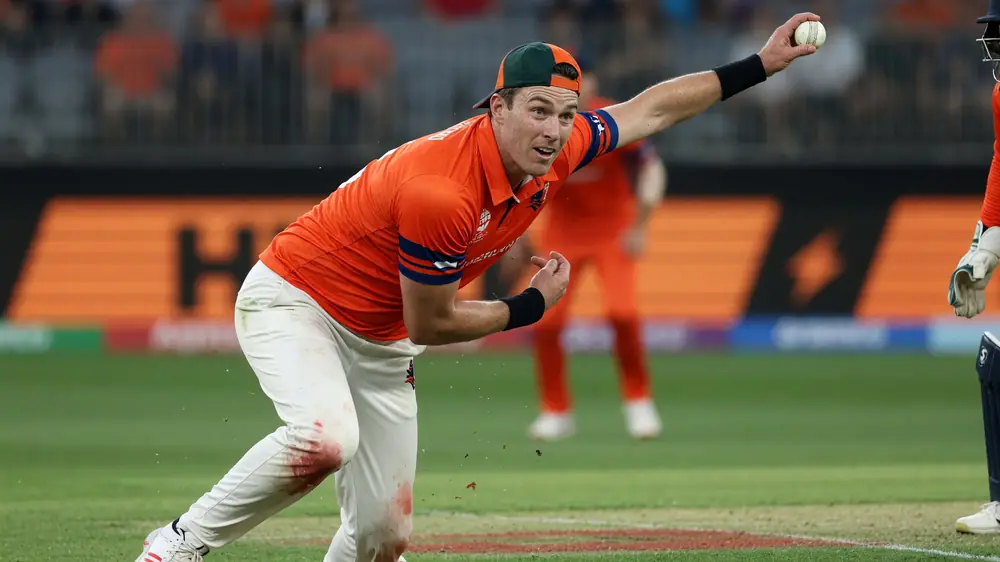 A seam-bowling all-rounder in Netherlands colours captured mid-delivery during an international white-ball match